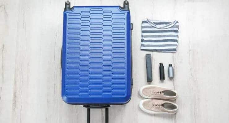 blue colored luggage