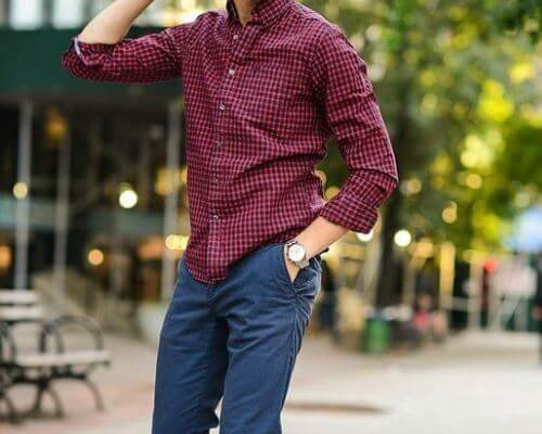 wearing red shirt and navy blue pants